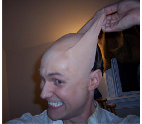 Ripping off the skull cap after the Demetri Martin shoot